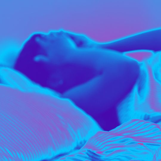 stock photo hypercolored blue and pink of a person in bed covering their eyes with their hands